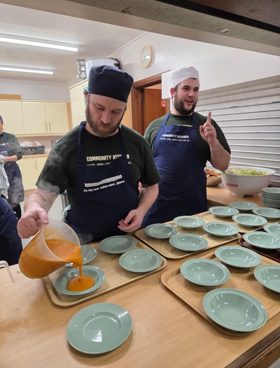 Picture of Giles working in the Kitchen alongside Adam